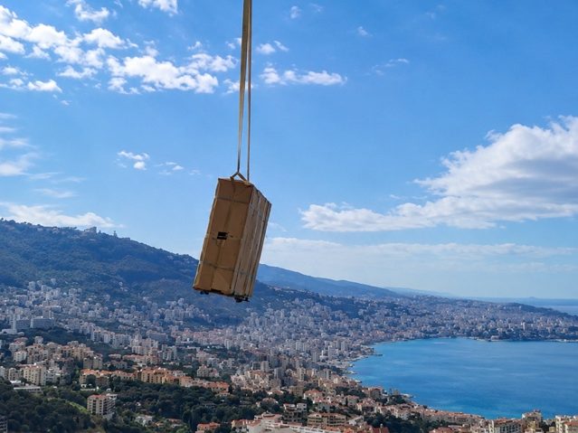 Salvado crane lifting a safe for delivery over Beirut