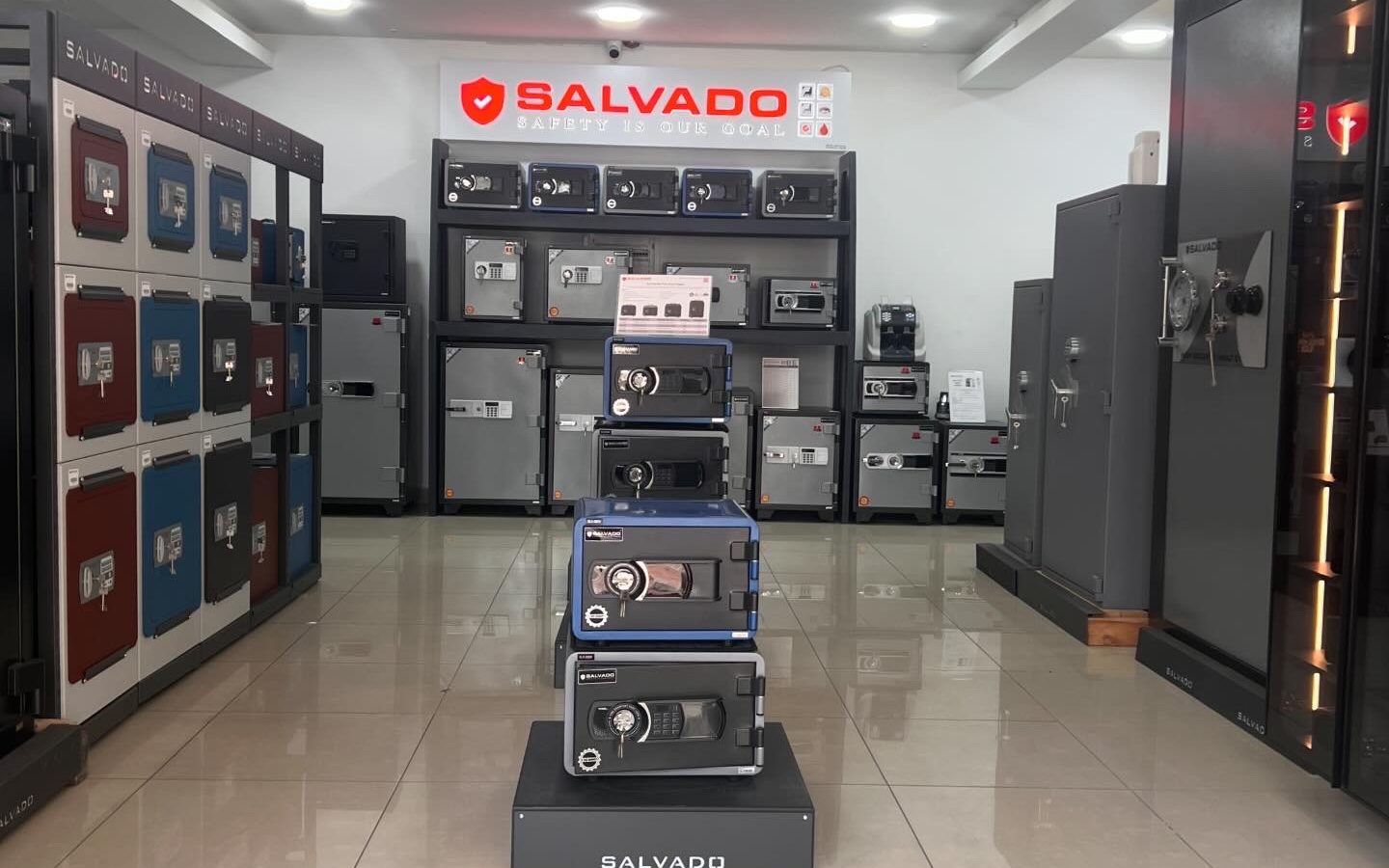 Salvado showroom with branded signage and colorful safe displays